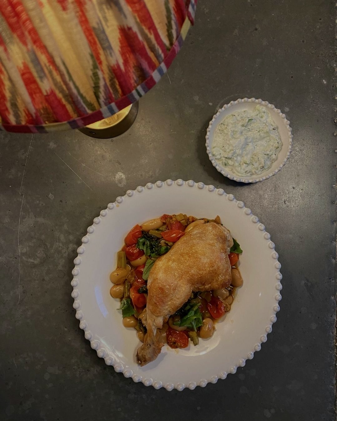 Crispy roast chicken with tomatoey butter beans