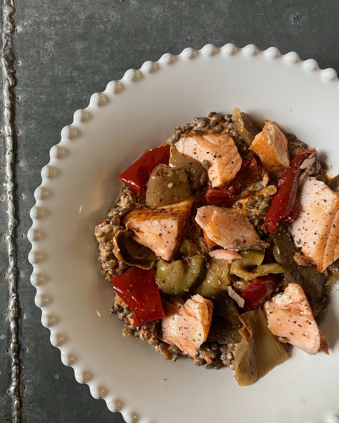 Salmon with harissa roasted vegetables, chickpeas & lime yogurt