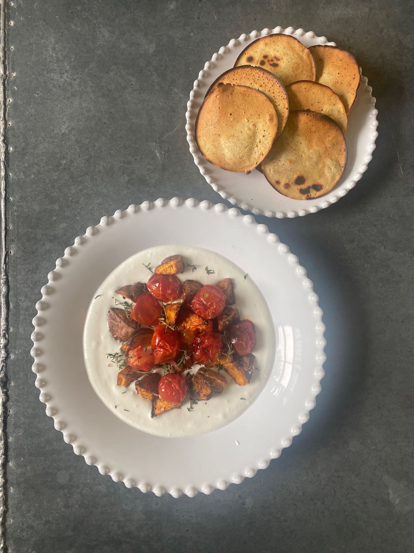 Whipped feta with roast sweet potato, tomato & crisps